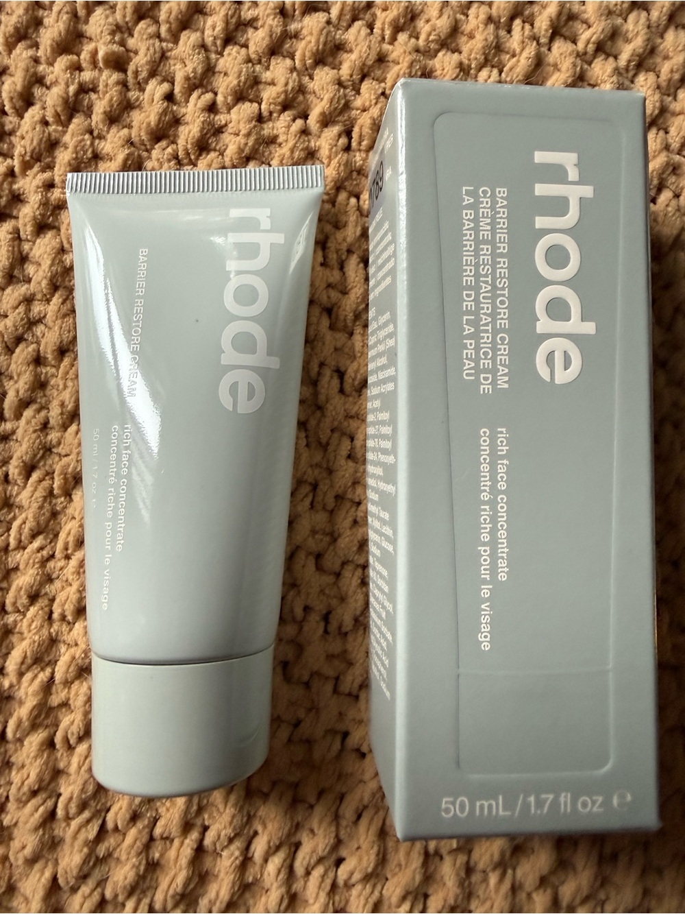 RHODE Barrier Restore Cream in pale gray tube and box